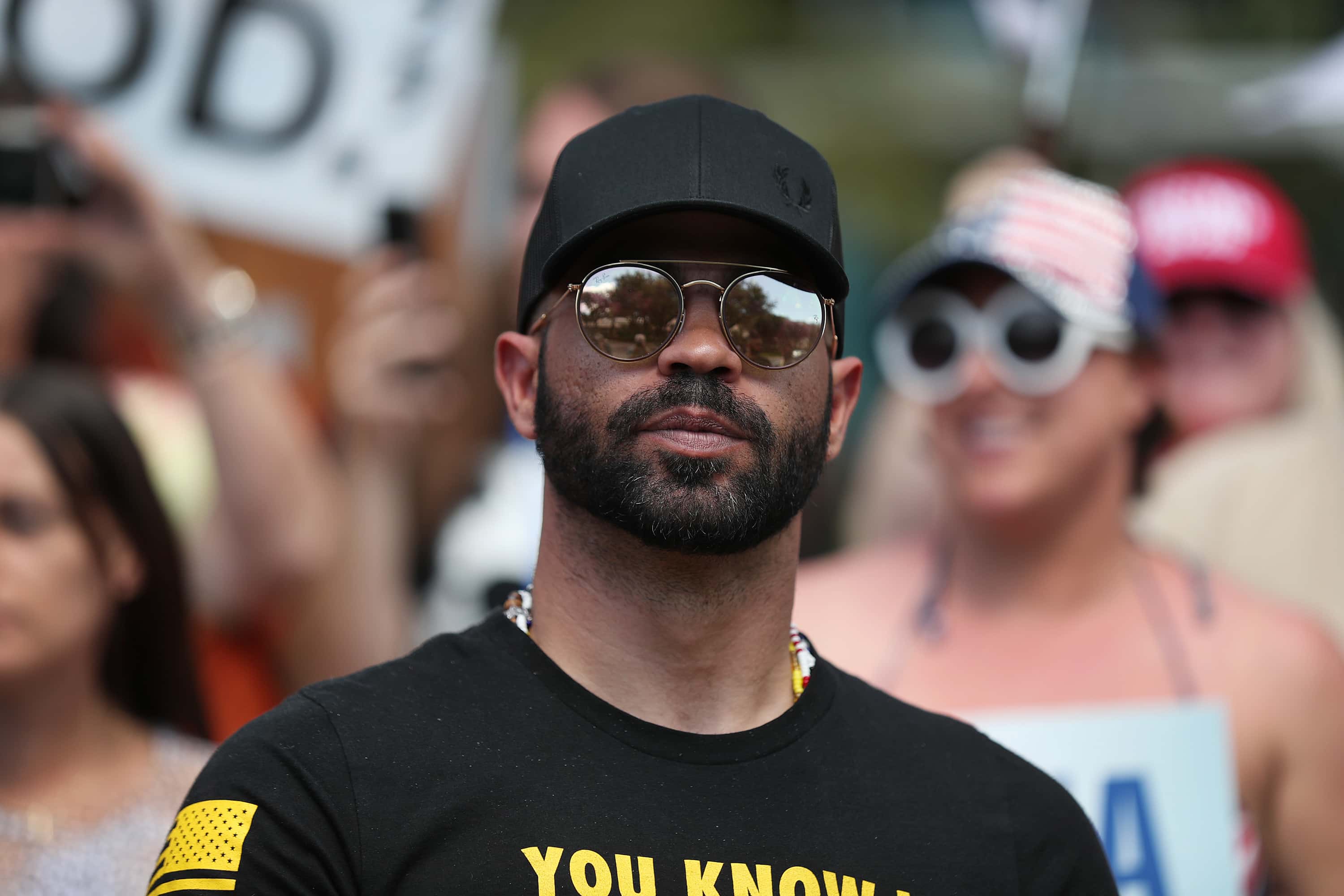 ORLANDO, FLORIDA - FEBRUARY 27: Enrique Tarrio, leader of the Proud Boys, stands outside of the Hyat