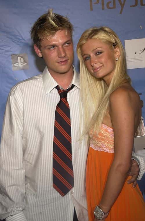 Nick Carter and Paris Hilton arrive for the release of the S. Carter Tennis shoe party at the Playstation 2 Estate on July 3, 2004 in South Hampton, New York.