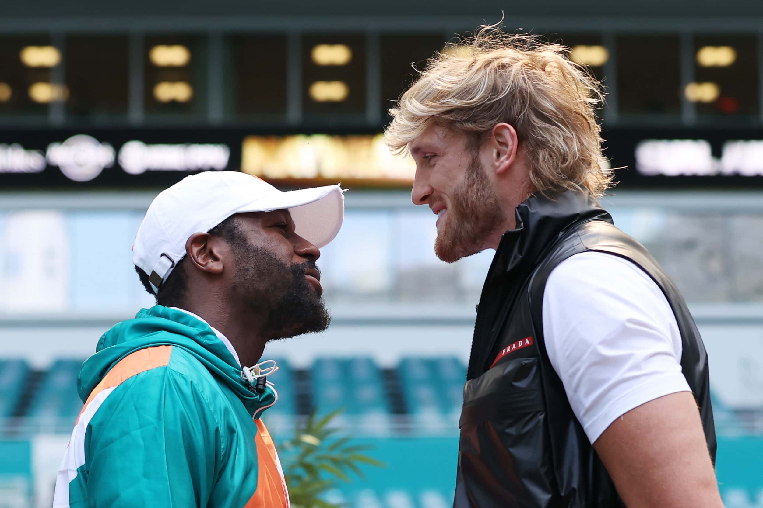 MIAMI GARDENS, FLORIDA - MAY 06:  Floyd Mayweather and Logan Paul face off during media availability