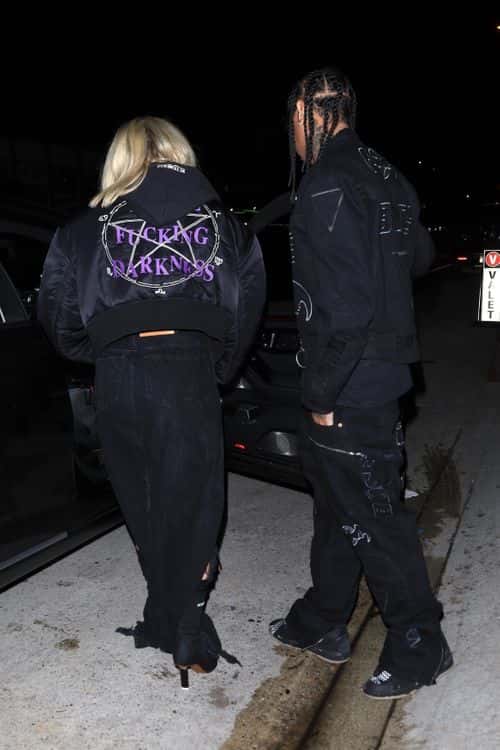 Tyga teamed his bomber jacket with Avril by wearing a matching graphic trousers and a baggy t-shirt (Backgrid)