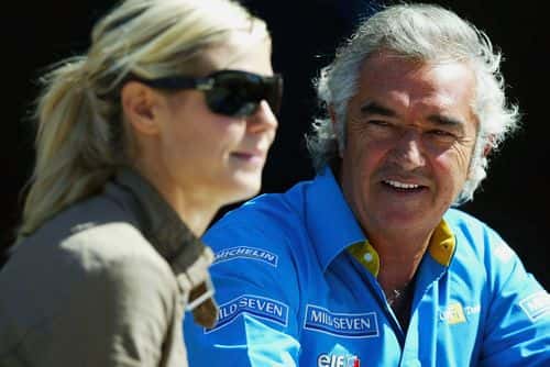 Flavio Briatore with girlfriend Heidi Klum chat in the paddock during the Formula One United States Grand Prix, on September 27, 2003 in Indianapolis, Indiana, USA.