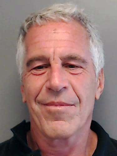 In this handout provided by the Florida Department of Law Enforcement, Jeffrey Epstein poses for a sex offender mugshot after being charged with procuring a minor for prostitution on July 25, 2013 in Florida.