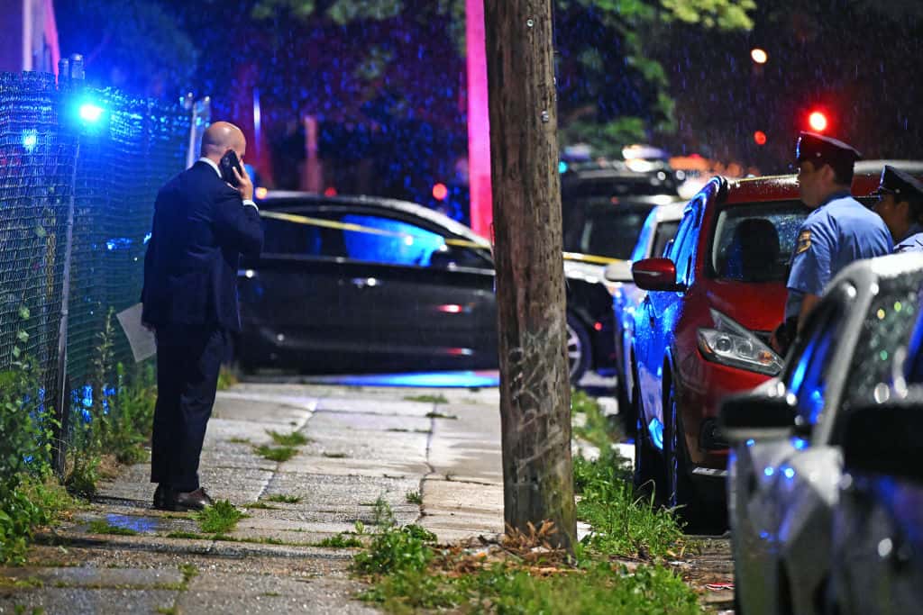 PHILADELPHIA, PENNSYLVANIA - JULY 3: Police work the scene of a shooting on July 3, 2023 in Philadelphia, Pennsylvania. Early reports say the suspect is in custody after shooting 6 people in the Kingsessing section of Philadelphia on July 3rd. (Photo by Drew Hallowell/Getty Images)