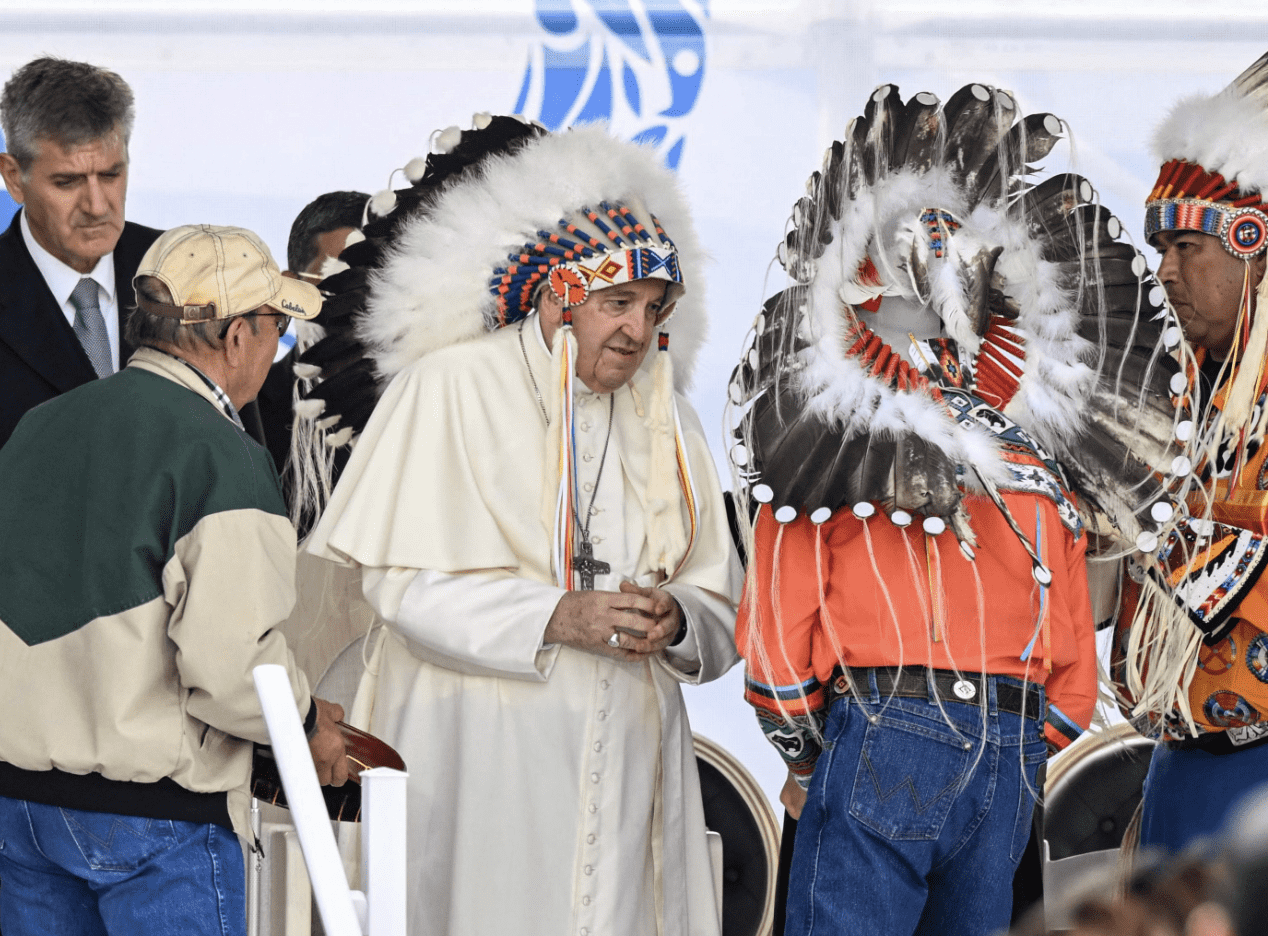 Pope Francis wears a traditional Indian headdress during his apology tour in Canada. (Photo: @Tonya_Song/Twitter)