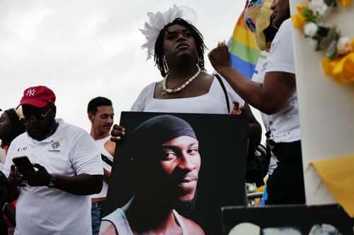 People gather at a memorial for O’Shae Sibley on August 04, 2023 in New York City. The memorial was held at the gas station where he was murdered last weekend while dancing with friends. Sibley and friends started 