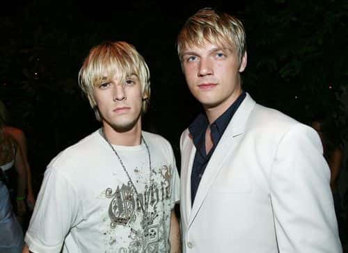 Singers Aaron Carter (L) and Nick Carter (R) attend the Celebrity Locker Room
