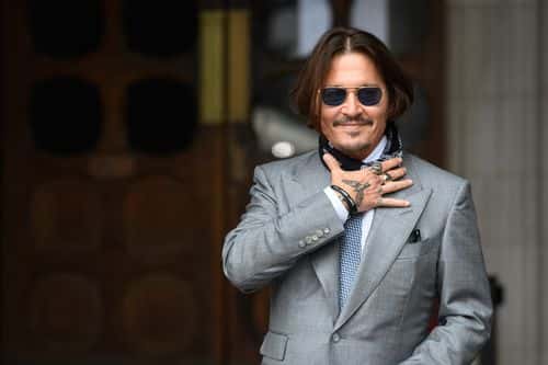 Actor Johnny Depp arrives at the Royal Courts of Justice, Strand on July 16, 2020 in London, England. American actor Johnny Depp is taking News Group Newspapers, publishers of The Sun, to court over allegations that he was violent towards his ex-wife, Amber Heard, 34. (Photo by Leon Neal/Getty Images)