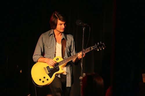 Guitarist Taylor Locke of the band Rooney, performs at Station Four club on Sunday, February 6, 2011 in St. Paul, Minnesota. (Photo by Adam Bettcher/Getty Images)