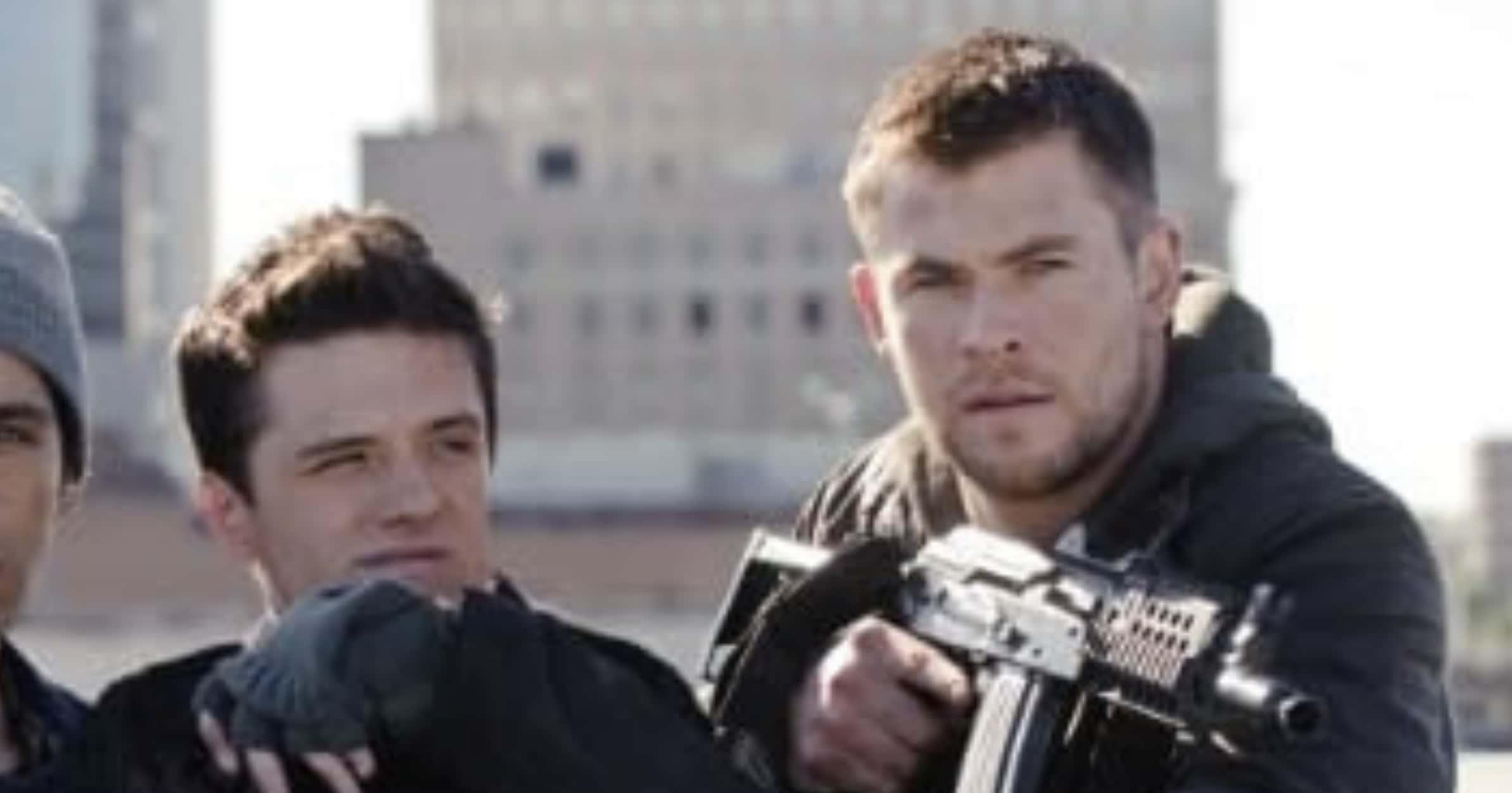 Chris Hemsworth (R) with his much shorter co-star Josh Hutcherson in the 2012 film 'Red Dawn' (Lionsgate)