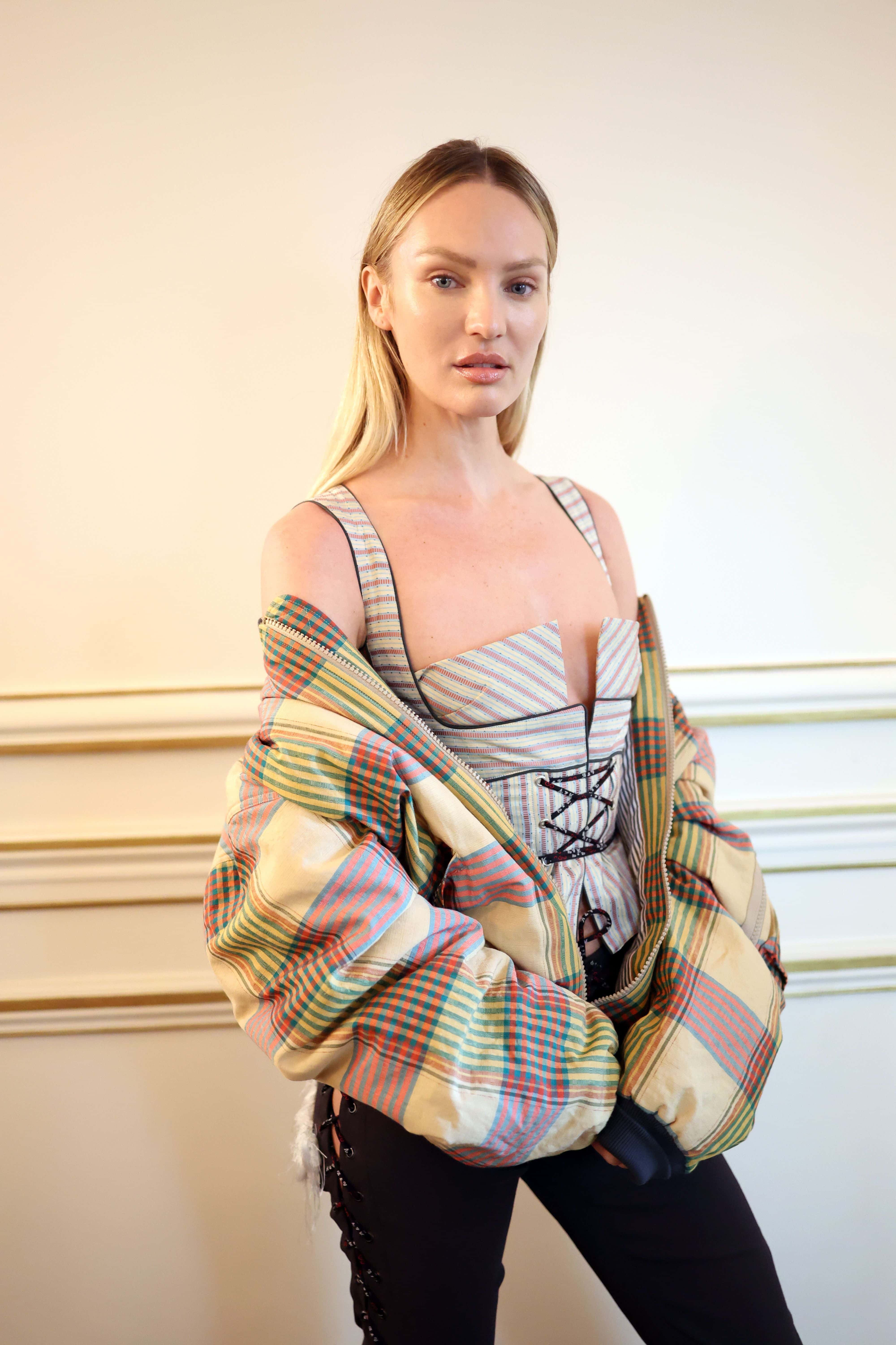 (EDITORIAL USE ONLY - For Non-Editorial use please seek approval from Fashion House) Candice Swanepoel poses backstage prior to the Vivienne Westwood Womenswear Fall Winter 2023-2024 show as part of Paris Fashion Week on March 04, 2023 in Paris, France.