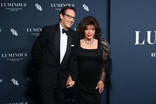 Percy Gibson and Joan Collins attend the BFI London Film Festival Luminous Gala at The Londoner Hotel on September 29, 2022 in London, England.