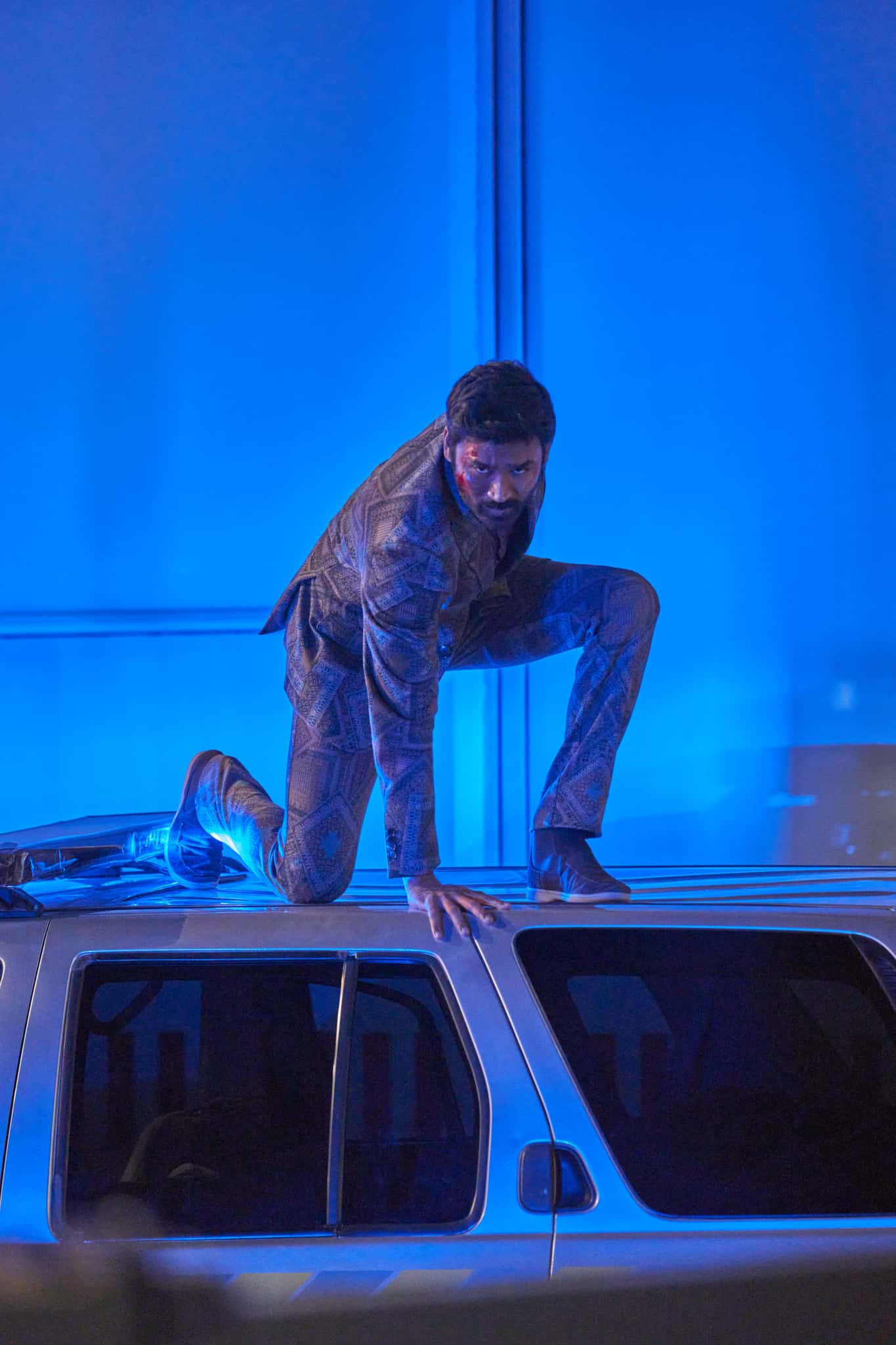 Dhanush as Avik San in 'The Gray Man' (Netflix)