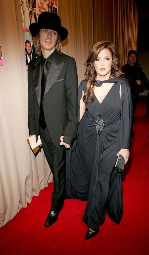 Musician Lisa Marie Presley (R) and Michael Lockwood attend the Miramax 2005 Golden Globes After Party at Trader Vics on January 16, 2005 in Beverly Hills, California. (Photo by Vince Bucci/Getty Images)