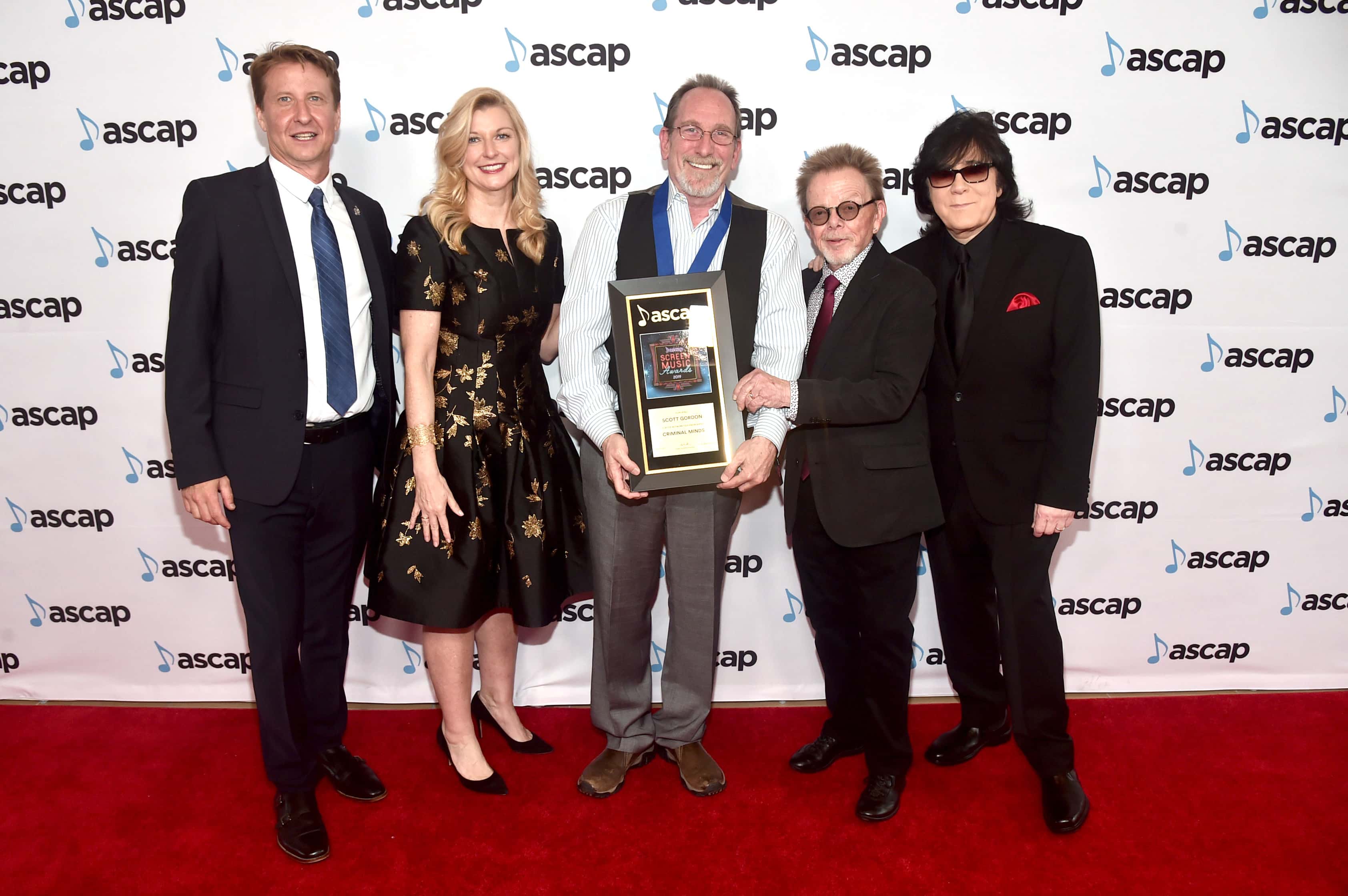 (L-R) ASCAP SVP: Film & TV Music / New Media Shawn Lemone, ASCAP CEO Elizabeth Matthews, Composer Scott Gordon, winner of the award for Top Network Television Series for 'Criminal Minds,' ASCAP President and Chairman of the Board Paul Williams and ASCAP EVP Membership John Titta attend the ASCAP 2019 Screen Music Awards at The Beverly Hilton Hotel on May 15, 2019 in Beverly Hills, California. (Photo by Alberto E. Rodriguez/Getty Images for ASCAP)