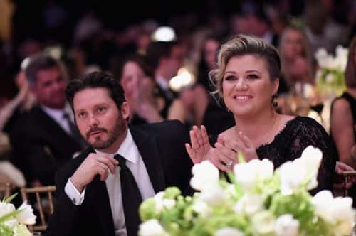 Brandon Blackstock (L) and singer/songwriter Kelly Clarkson attend Muhammad Ali's Celebrity Fight Night XXI at the JW Marriott Phoenix Desert Ridge Resort & Spa on March 28, 2015 in Phoenix, Arizona.