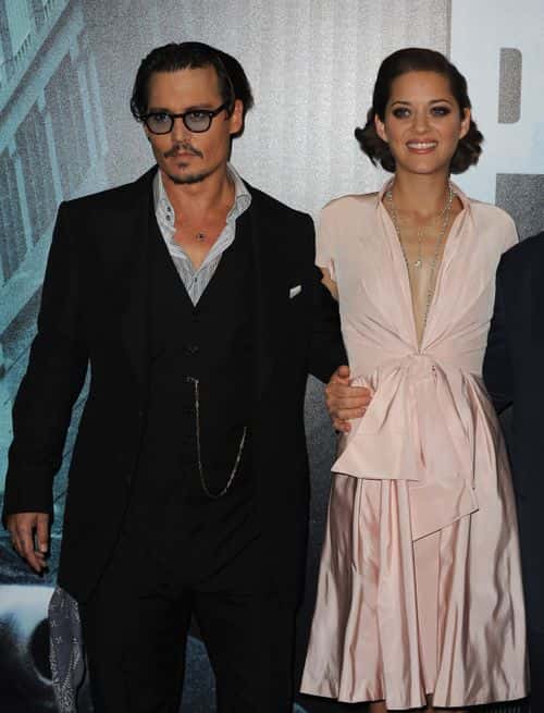 U.S Actor Johnny Depp and french actress Marion Cotillard attend the 