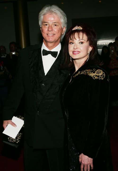 Singer Naomi Judd and husband Larry Strickland arrive at the 27th Annual Kennedy Center Honors Gala at The Kennedy Center for the Performing Arts December 5, 2004 in Washington, DC.