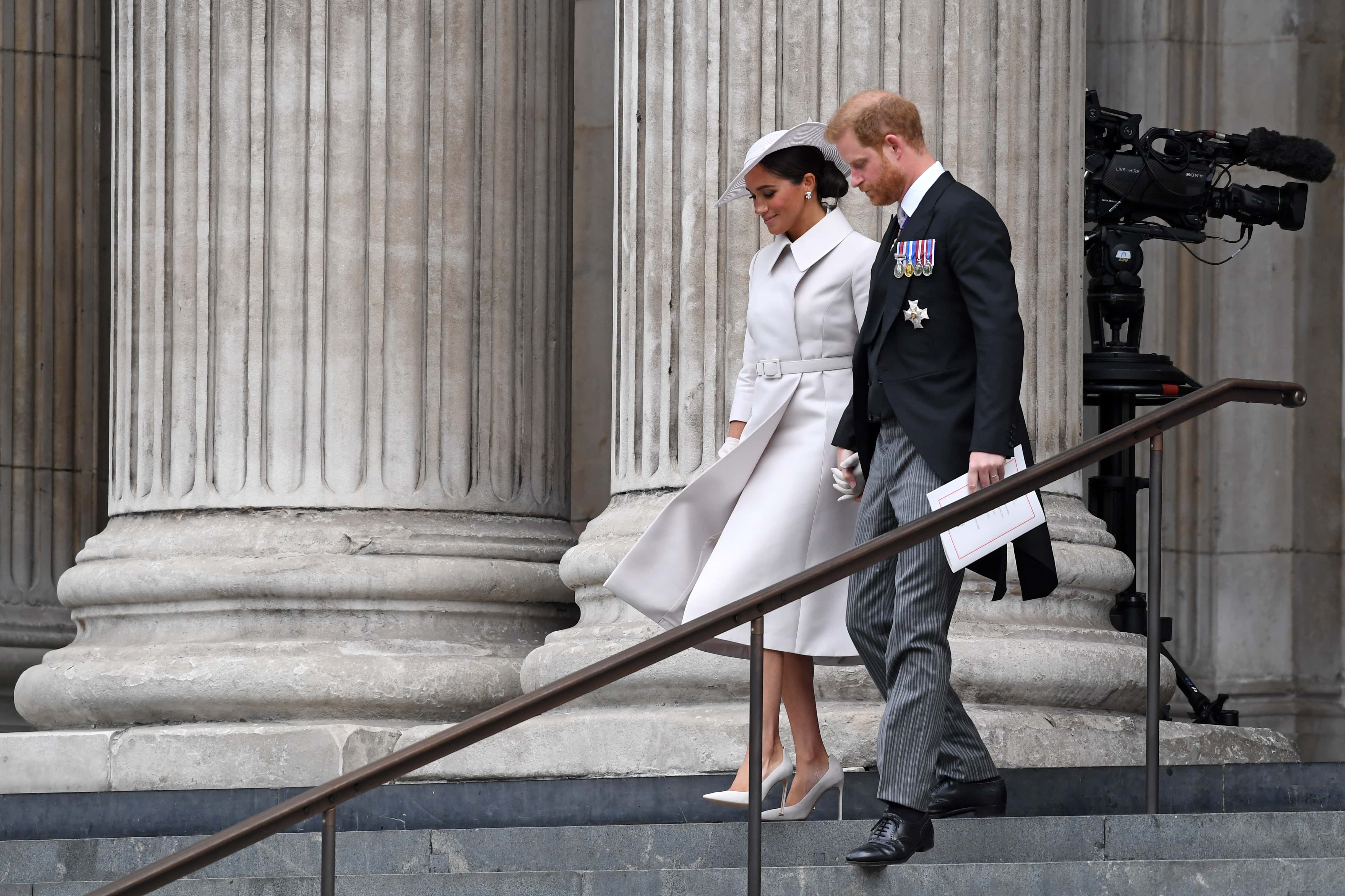 Prince Harry, Duke of Sussex, and Meghan, Duchess of Sussex depart the National Service of Thanksgiving at St Paul's Cathedral on June 03, 2022 in London, England. The Platinum Jubilee of Elizabeth II is being celebrated from June 2 to June 5, 2022, in the UK and Commonwealth to mark the 70th anniversary of the accession of Queen Elizabeth II on 6 February 1952. (Photo by Chris J Ratcliffe/Getty Images)