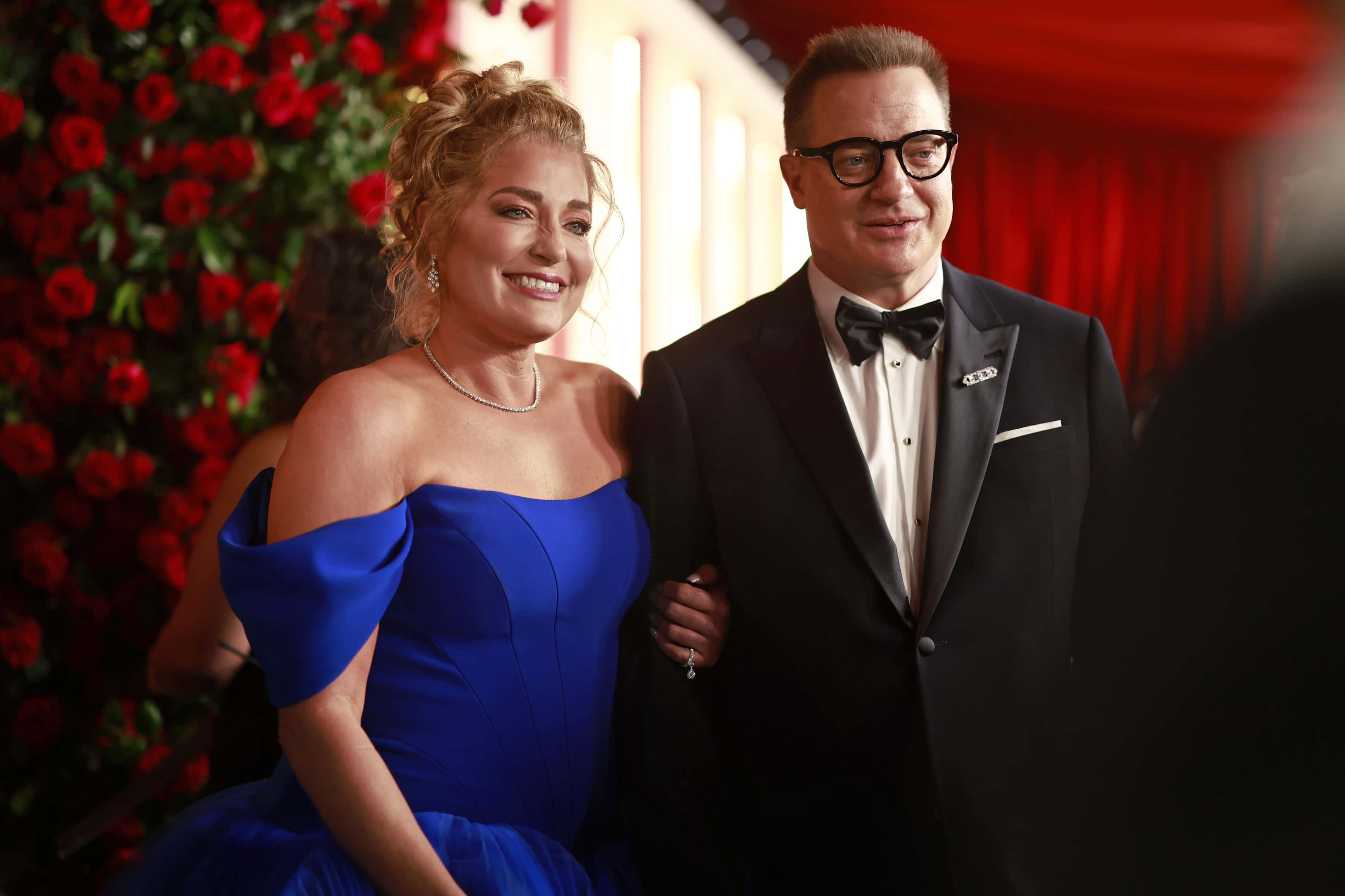 (L-R) Jeanne Moore and Brendan Fraser attend the 95th Annual Academy Awards on March 12, 2023 in Hollywood, California.