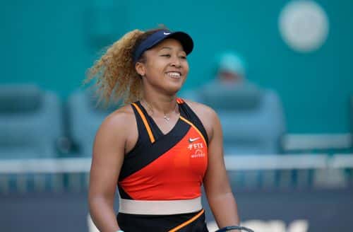 Naomi Osaka of Japan celebrates  after defeating Alison Riske of United States during the Women’s Singles match on Day 8 of the 2022 Miami Open presented by Itaú at Hard Rock Stadium on March 28, 2022 in Miami Gardens, Florida.