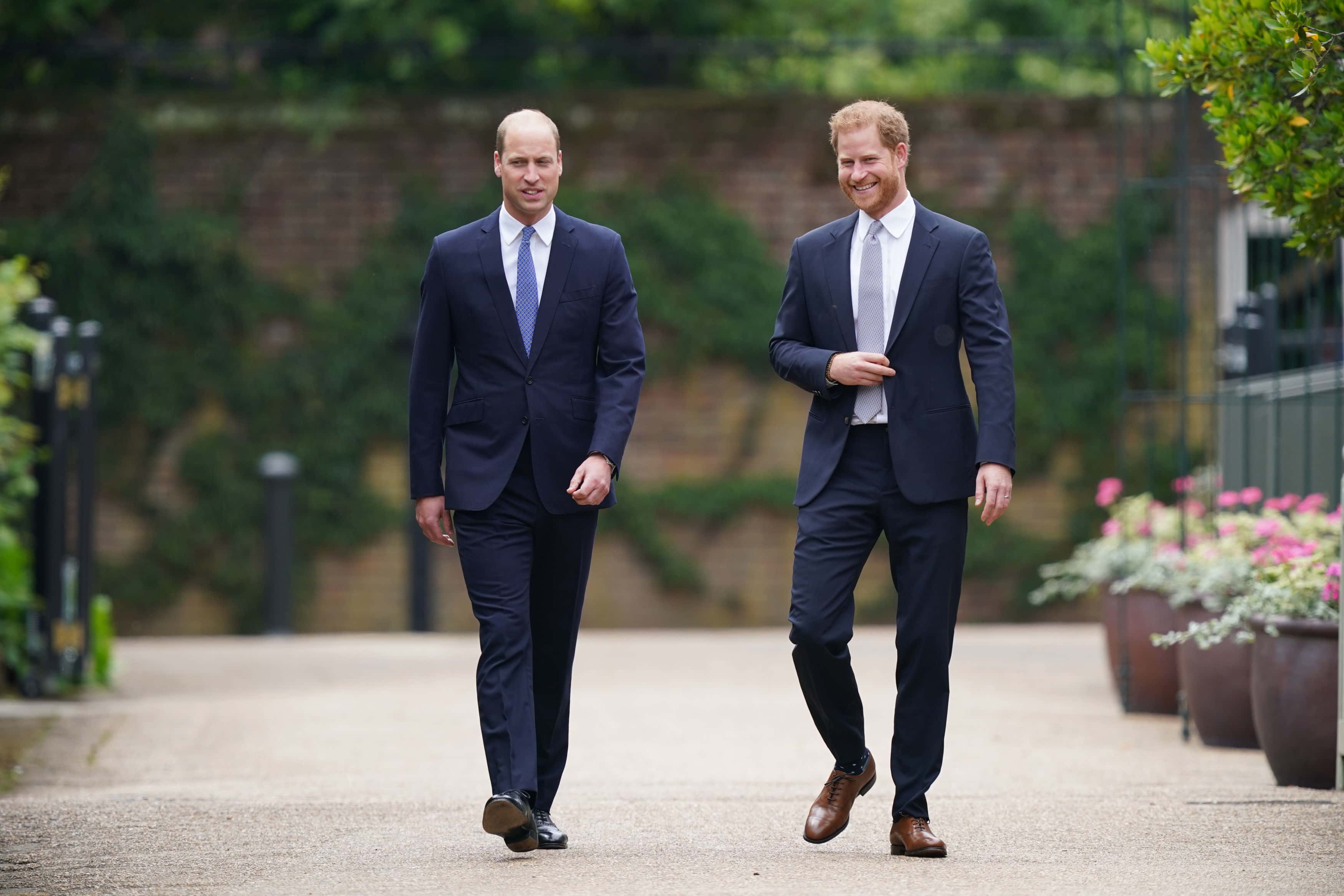 Prince William, Duke of Cambridge (left) and Prince Harry, Duke of Sussex arrive for the unveiling of a statue they commissioned of their mother Diana, Princess of Wales, in the Sunken Garden at Kensington Palace, on what would have been her 60th birthday on July 1, 2021 in London, England. Today would have been the 60th birthday of Princess Diana, who died in 1997. At a ceremony here today, her sons Prince William and Prince Harry, the Duke of Cambridge and the Duke of Sussex respectively, will unveil a statue in her memory.