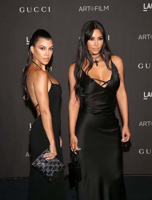 Kourtney Kardashian and Kim Kardashian attend the 2018 LACMA Art + Film Gala at LACMA on November 03, 2018 in Los Angeles, California.