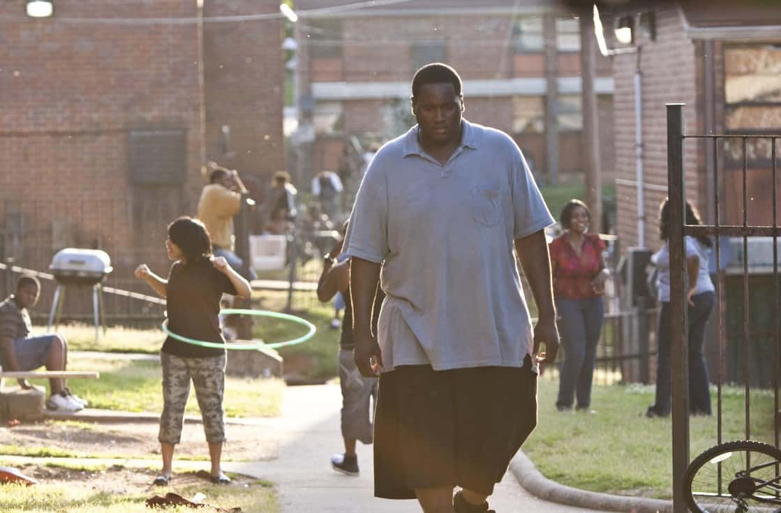 Quinton Aaron's height is a talking point in the movie (IMDb)