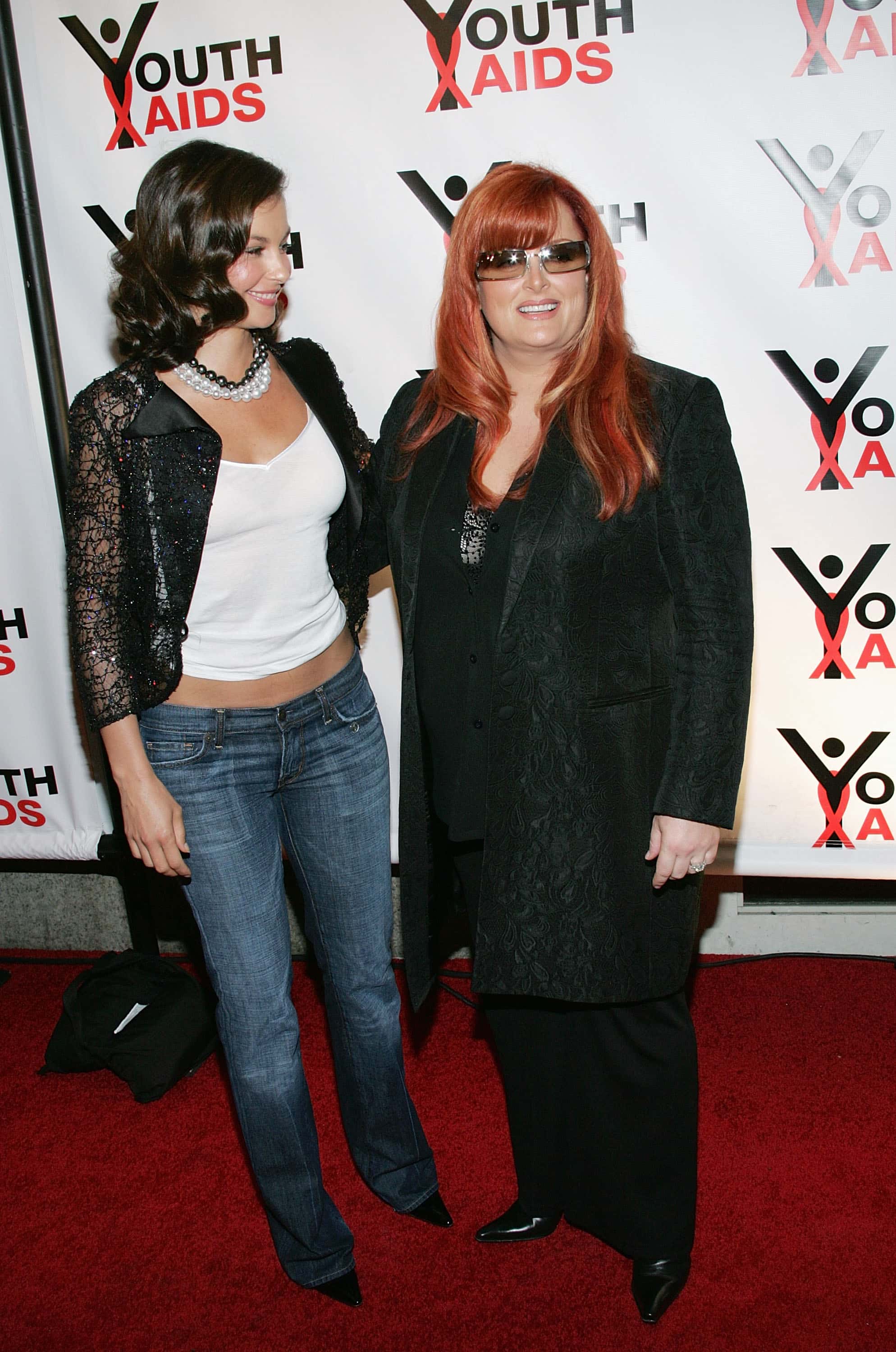 Actress Ashley Judd and sister singer Wynonna Judd attend the YouthAIDS benefit gala on September 23, 2004 at Capitale, in New York City.