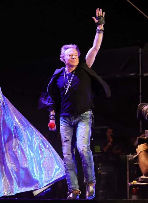 Axl Rose of Guns N' Roses  performs onstage with Carrie Underwood during Day 2 of the 2022 Stagecoach Festival at the Empire Polo Field on April 30, 2022 in Indio, California.