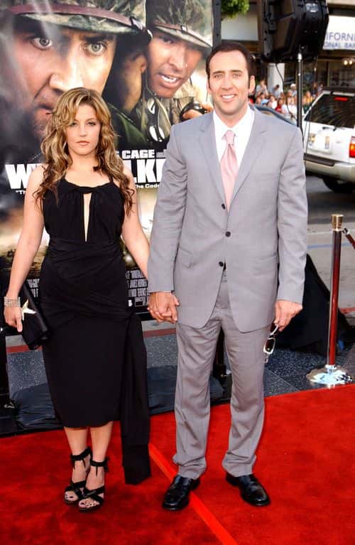 (FILE PHOTO) Lisa Marie Presley, daughter of Elvis Presley, and actor Nicolas Cage attend the Los Angeles Premiere of MGM's