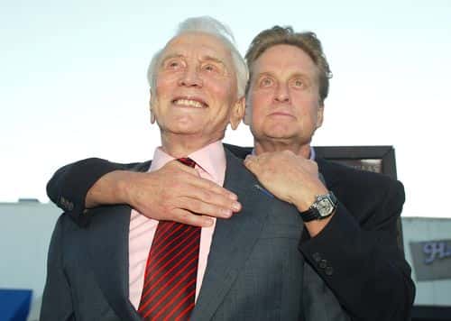 Actor Kirk Douglas (L) and son producer/actor Michael Douglas arrive at the premiere of 