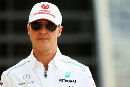 Michael Schumacher of Germany and Mercedes GP walks in the paddock following practice for the Brazilian Formula One Grand Prix at the Autodromo Jose Carlos Pace on November 23, 2012 in Sao Paulo, Brazil. (Photo by Mark Thompson/Getty Images)