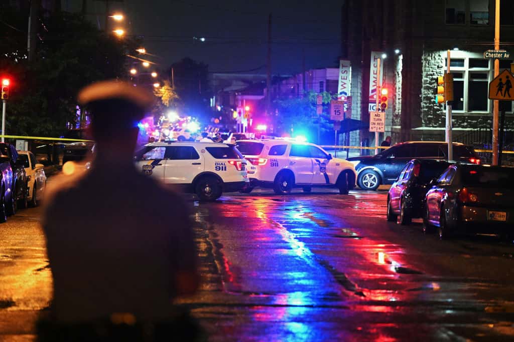 PHILADELPHIA, PENNSYLVANIA - JULY 3: Police work the scene of a shooting on July 3, 2023 in Philadelphia, Pennsylvania. Early reports say the suspect is in custody after shooting 6 people in the Kingsessing section of Philadelphia on July 3rd. (Photo by Drew Hallowell/Getty Images)