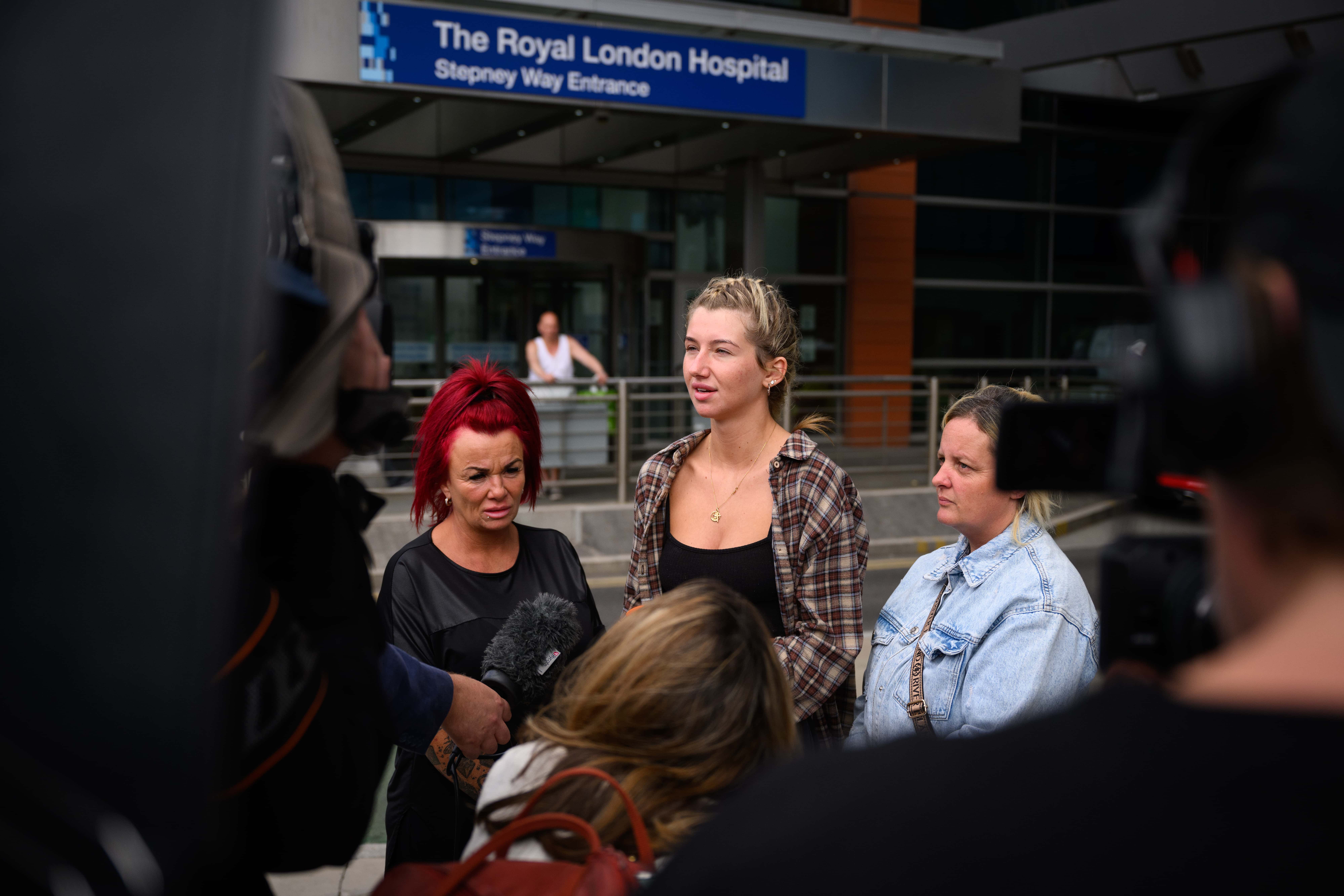 Ella Carter (C), the sister-in-law of Archie Battersbee, is interviewed by media outside the Royal London Hospital on August 02, 2022 in London, England. Hollie Dance and Paul Battersbee, the parents of Archie Battersbee, 12, have been fighting against the Doctors treating their son who have concluded that he is brain-stem dead and that continued life-support treatment is not in his best interests. (Photo by Leon Neal/Getty Images)