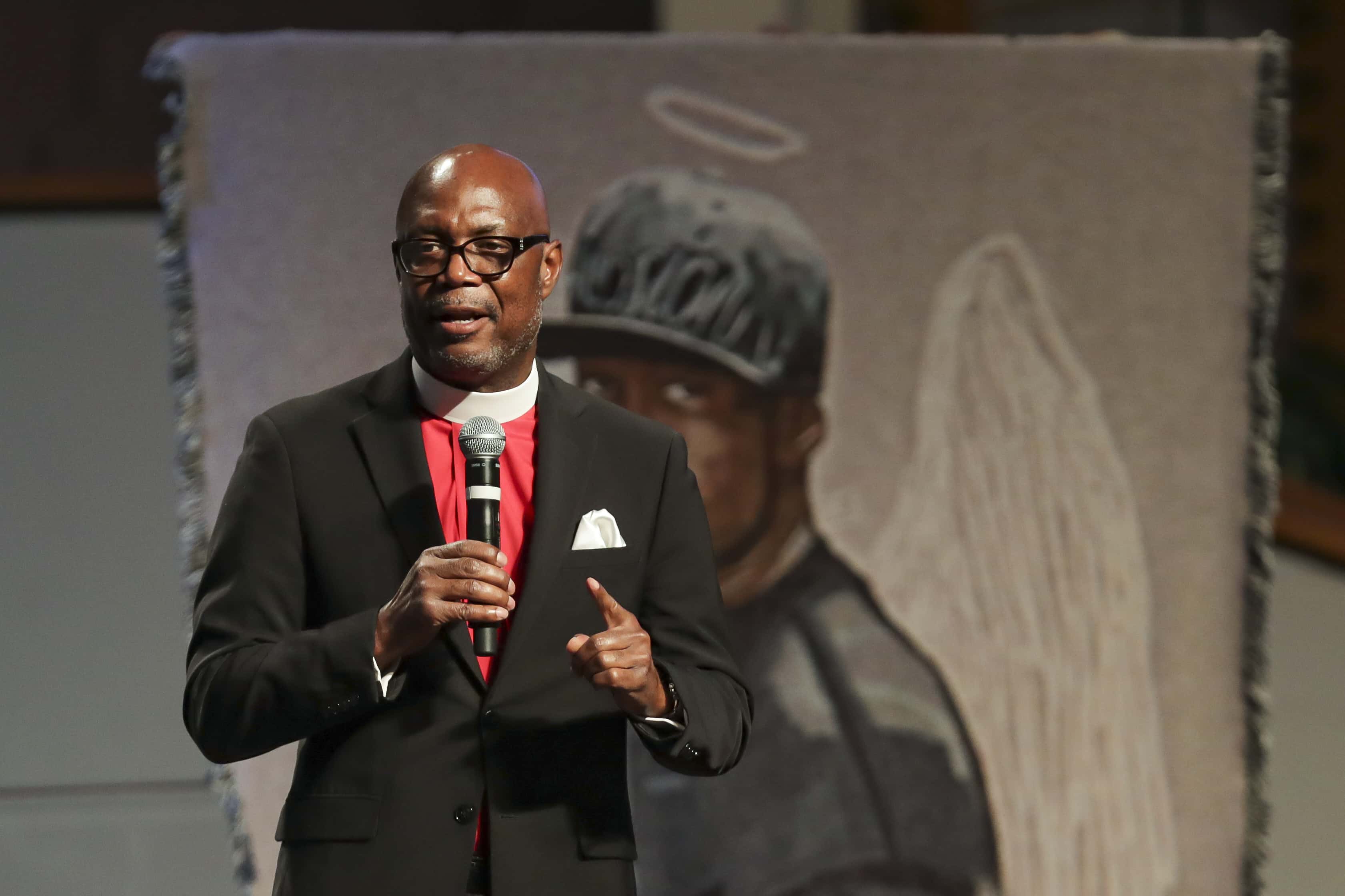 HOUSTON, TX - JUNE 09: Bishop James E. Dixon, II, introduces the Rev. Al Sharpton during the funeral for George Floyd at The Fountain of Praise church on June 9, 2020 in Houston, Texas. Floyd died after being restrained by Minneapolis Police officers on May 25, sparking global protests. (Photo by Godofredo A. Vásquez - Pool/Getty Images)
