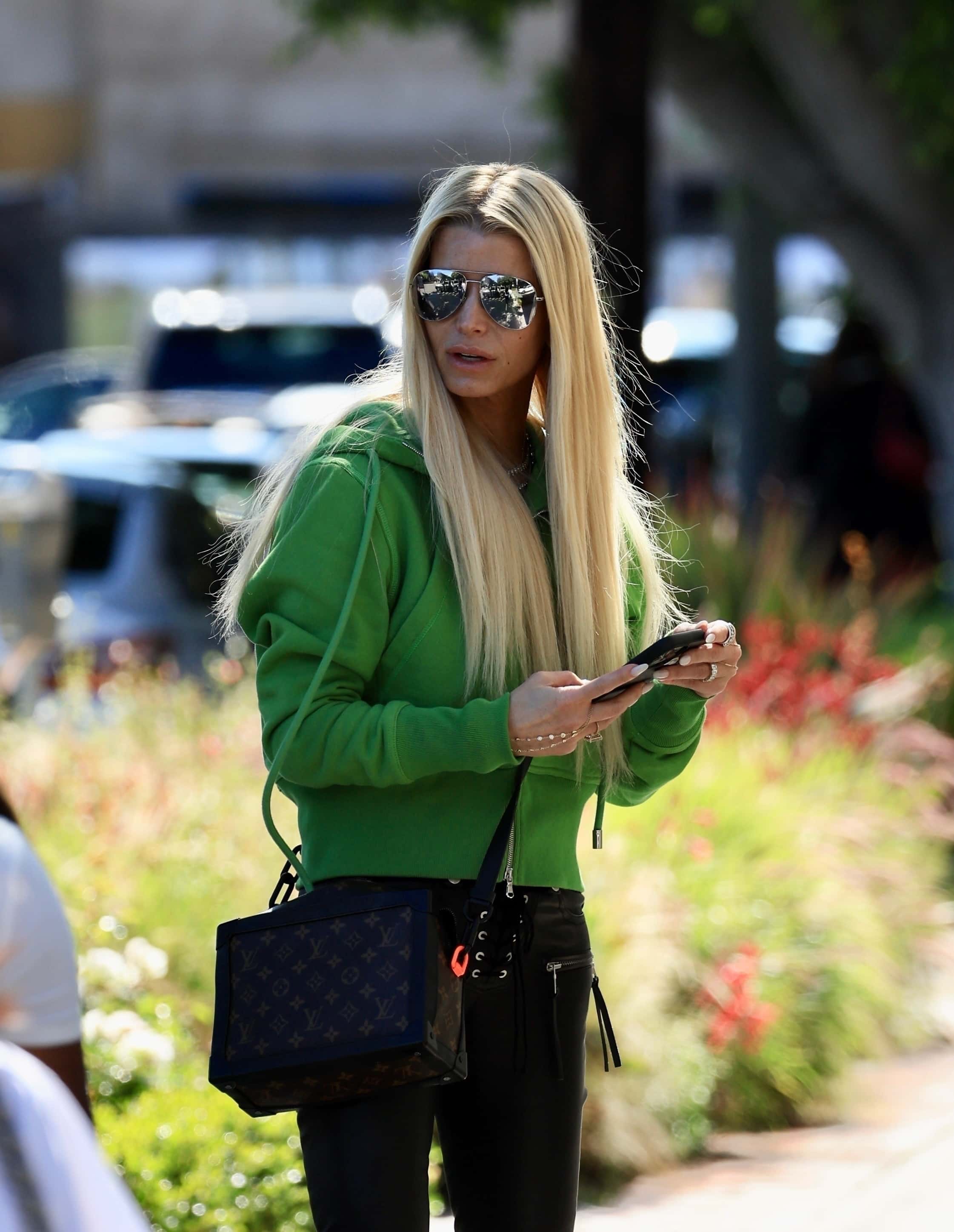 The 42-year-old Public Affair singer introduced her new line of handbags for her successful Jessica Simpson Collection (Backgrid)