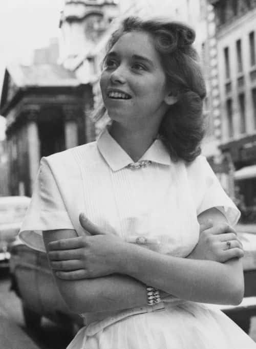 Myra Brown, first cousin once removed and third wife of American rock and roll star, Jerry Lee Lewis, in London at the beginning of Lewis's planned British tour, 26th May 1958. Thirteen year-old Myra's age, family relationship to Lewis, and the fact that he was still technically married to his previous wife, led to widespread controversy and the cancellation of the tour after three concerts. (Photo by Keystone/Hulton Archive/Getty Images)