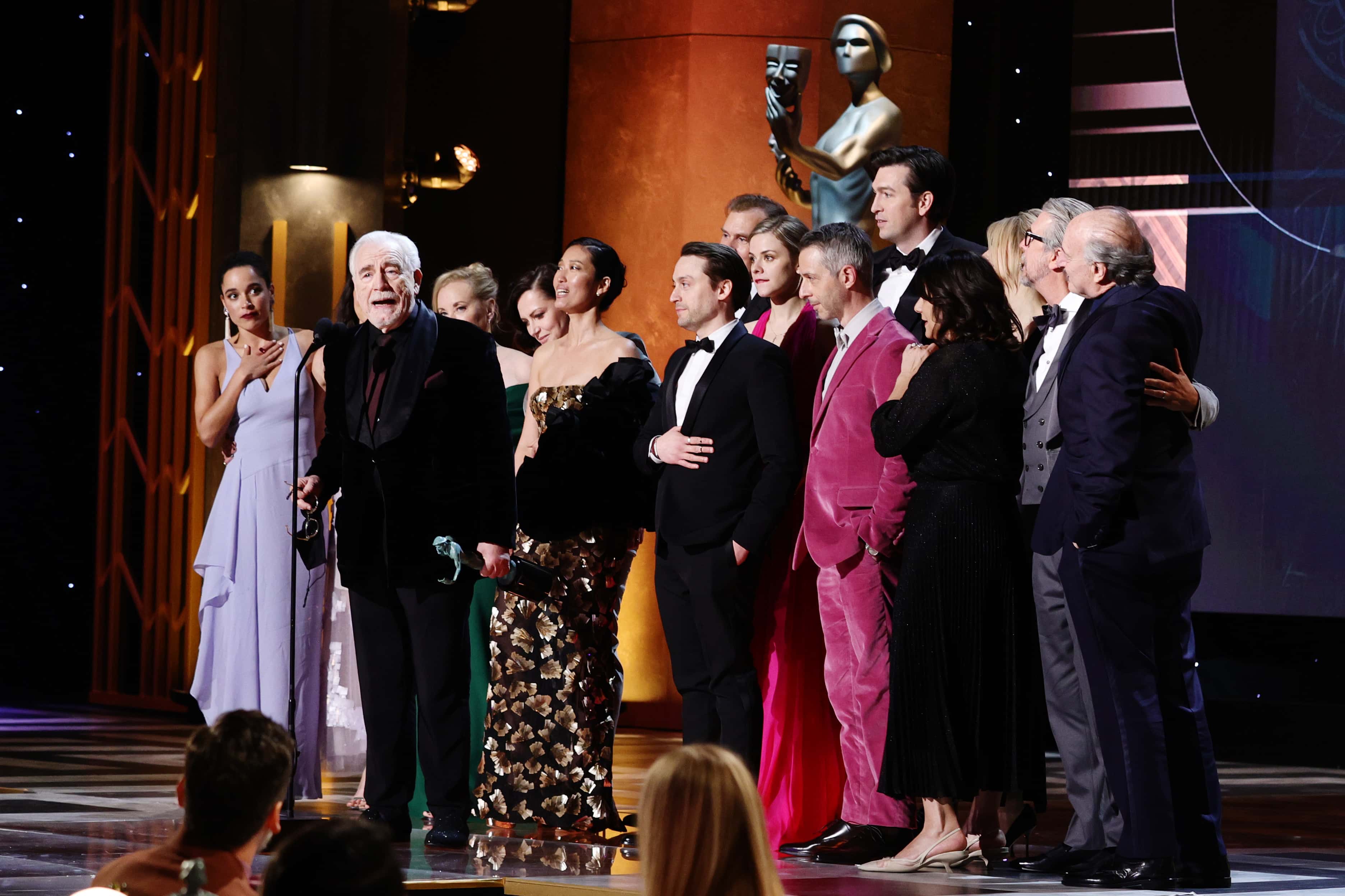 SANTA MONICA, CALIFORNIA - FEBRUARY 27: Cast members of 'Succession' accept the Outstanding Performance by an Ensemble in a Drama Series award onstage during the 28th Screen Actors Guild Awards at Barker Hangar on February 27, 2022 in Santa Monica, California. 1184596 (Photo by Dimitrios Kambouris/Getty Images for WarnerMedia)
