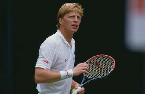 German professional tennis player Boris Becker during a match at The Championships, Wimbledon, London, 1987. (Photo by Chris Cole/Getty Images)