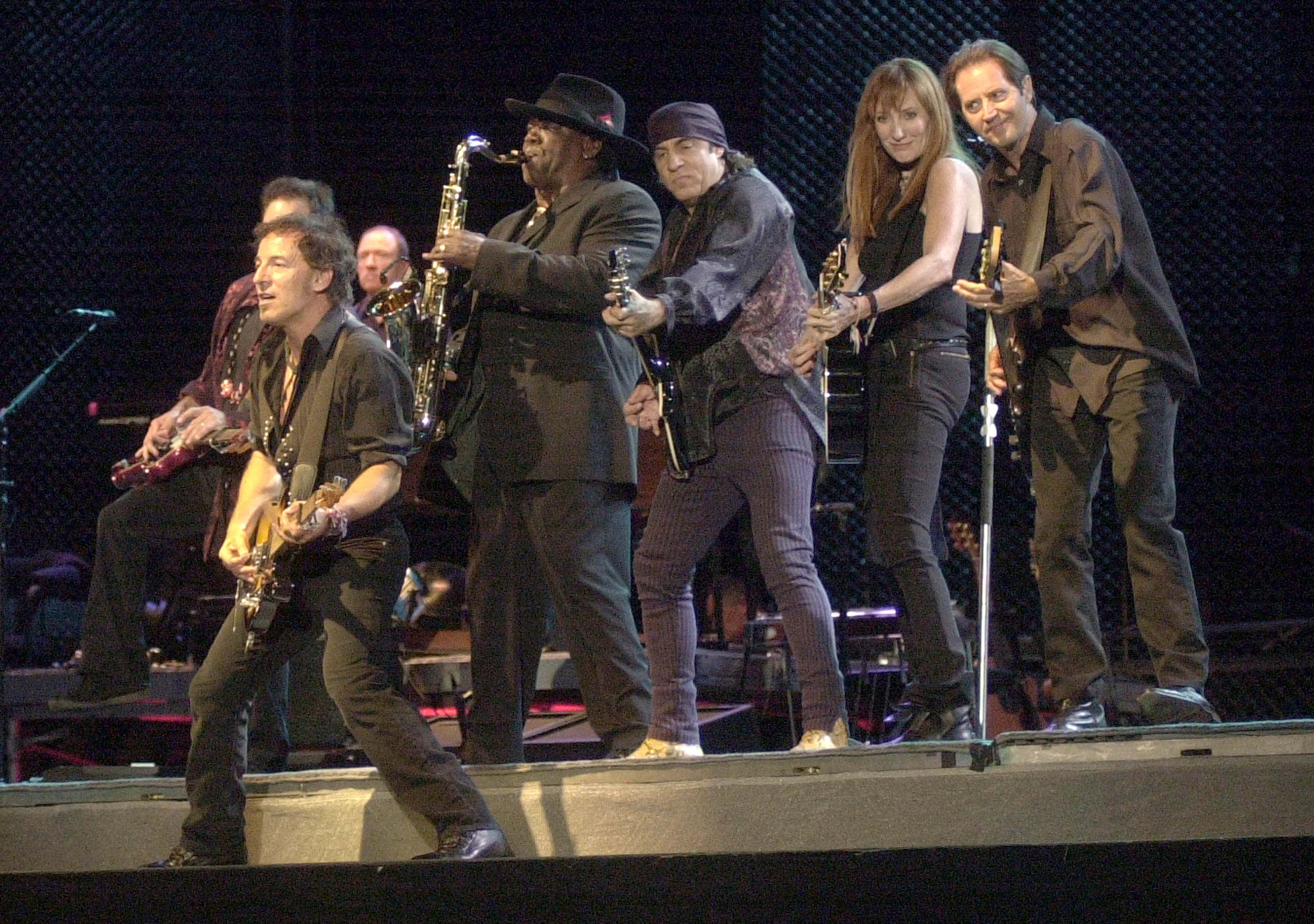 Bruce Springsteen (L) performs with members of The E Street Band on the first night of Bruce Springsteen's concert series at Fenway Park September 6, 2003 in Boston, Massachusetts. Springsteen is performing the first-ever rock concerts at Fenway Park September 6 and 7.