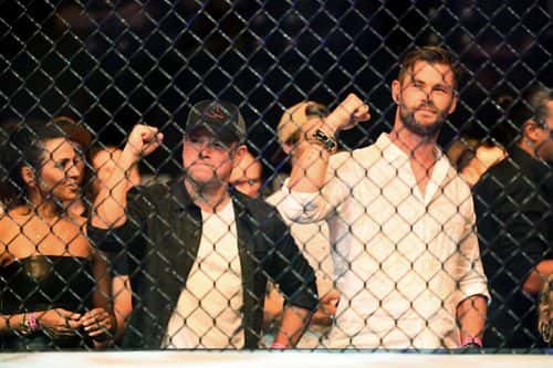 Chris Hemsworth and Matt Damon sit ringside during UFC234 at Rod Laver Arena on February 10, 2019 in Melbourne, Australia.