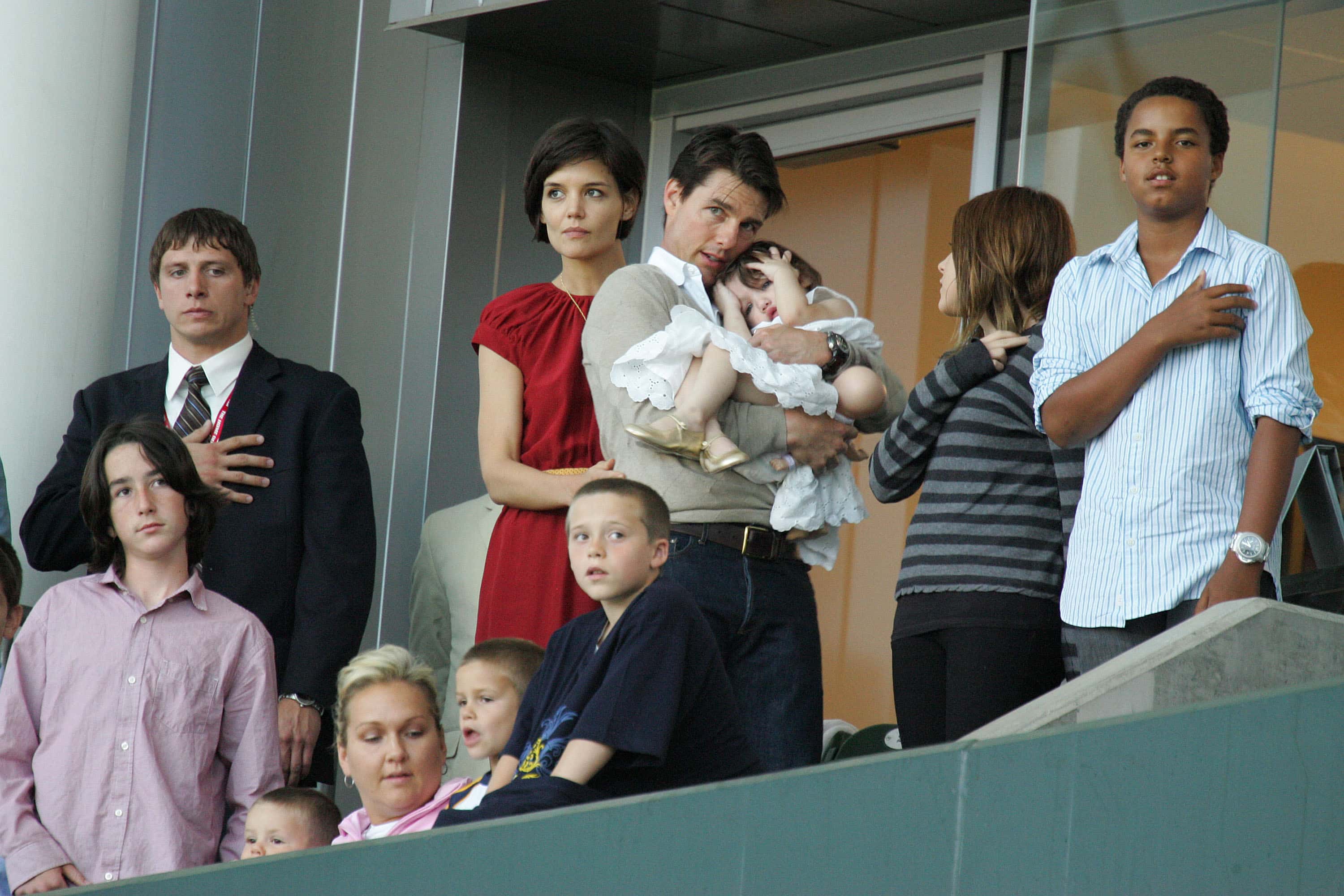 Tom Cruise (C) and Katie Holmes with daughters Suri Cruise, Isabella Kidman-Cruise (2nd R) and son Connor Kidman-Cruise (R), with David Beckham's sons Brooklyn (front R), Romeo and Cruz Beckham (front L), watch the Major League Soccer match between New York Red Bulls and LA Galaxy at the Home Depot Center May 10, 2008 in Carson, California. (Photo by Toby Canham/Getty Images)