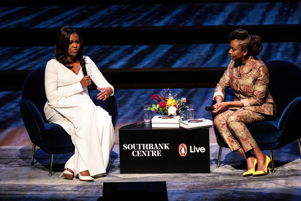 Former U.S. First Lady Michelle Obama speaks with Nigerian author Chimamanda Ngozi Adichie at The Royal Festival Hall on December 03, 2018 in London, England. (Photo by Jack Taylor/Getty Images)