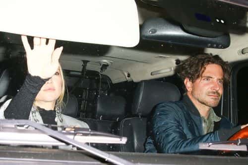 Bradley Cooper arrives at Leonardo DiCaprio's 48th birthday party with Kate Hudson (Backgrid)