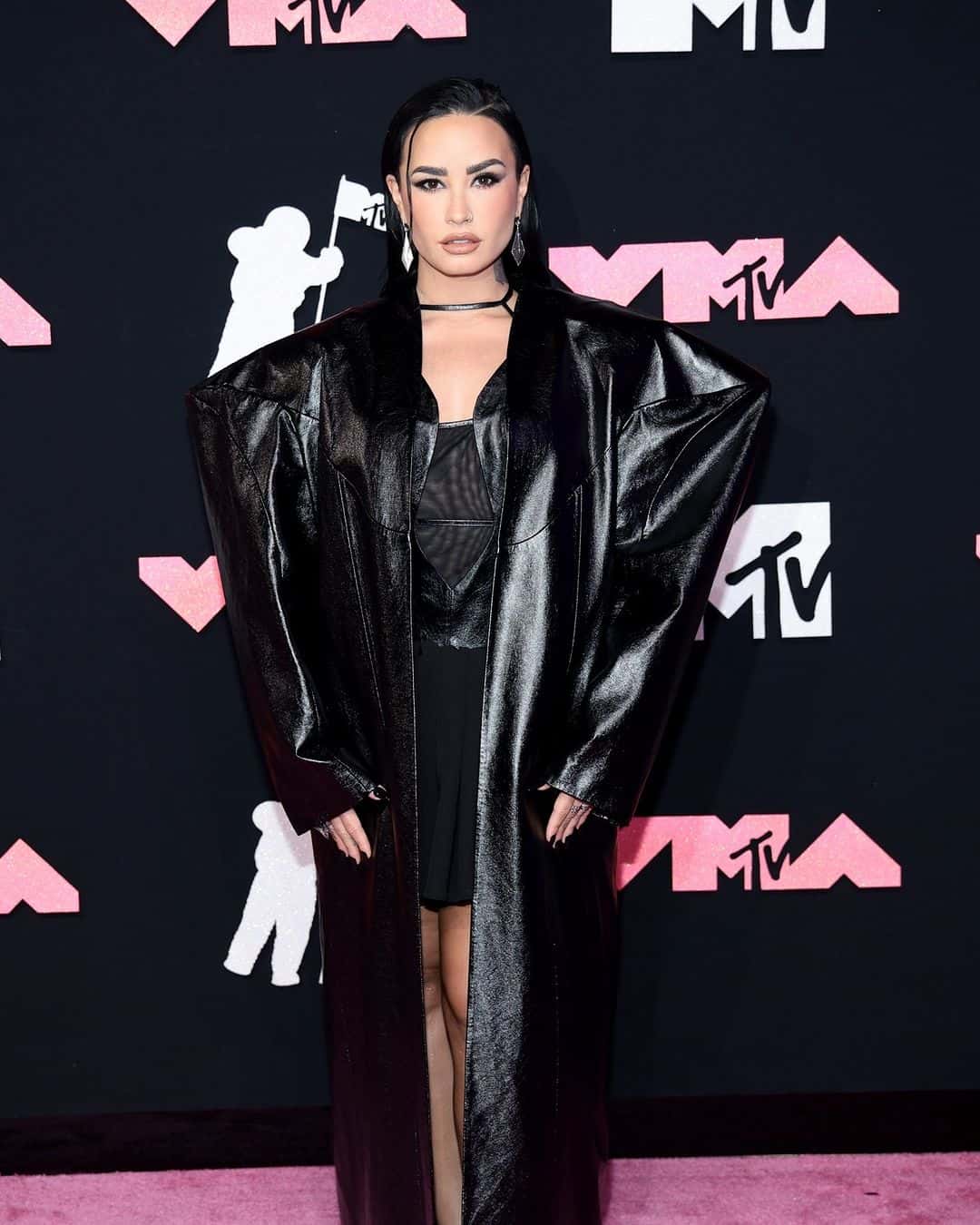 Demi Lovato's overcoat gave her voluminous shoulders (Instagram/@mtv)