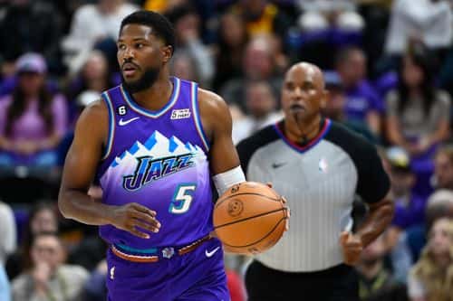 Malik Beasley #5 of the Utah Jazz in action during a game against the Denver Nuggets at Vivint Arena on October 19, 2022 in Salt Lake City, Utah. NOTE TO USER: User expressly acknowledges and agrees that, by downloading and or using this photograph, User is consenting to the terms and conditions of the Getty Images License Agreement.
