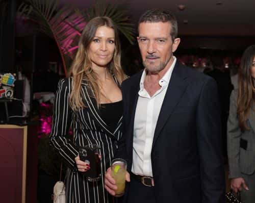 (L-R) Nicole Kimpel and Antonio Banderas attend the The CAA Pre-Oscar Party at Sunset Tower Hotel on March 10, 2023 in Los Angeles, California.