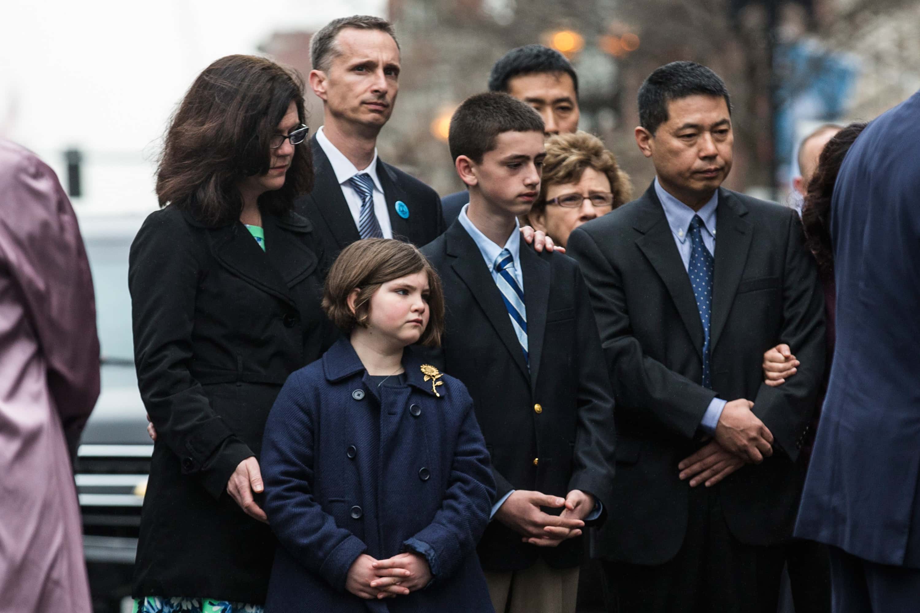 (L-R) Denise Richard, Bill Richard, Jane Richard and Henry Richard, the family of Martin Richard, an eight-year-old boy killed from a bomb at the Boston marathon, attend a wreath laying ceremony on the one year anniversary of the 2013 Boston Marathon Bombing, on April 15, 2014 in Boston, Massachusetts. Last year, two pressure cooker bombs killed three and injured an estimated 264 others during the Boston marathon, on April 15, 2013.