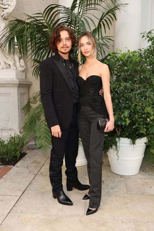 (L-R) Cole Sprouse and Ari Fournier attend the Ralph Lauren SS23 Runway Show at The Huntington Library, Art Collections, and Botanical Gardens on October 13, 2022 in San Marino, California.