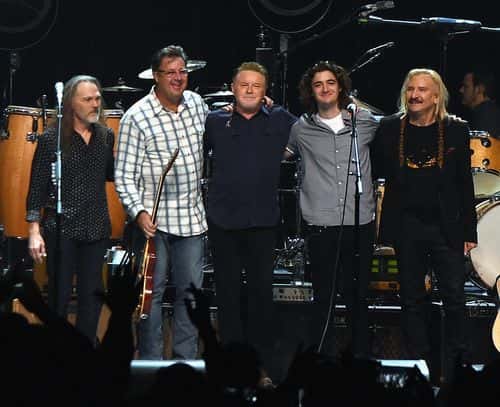 Eagles, Timothy B. Schmit, Vince Gill, Don Henley, Decon Frey and Joe Walsh perform during the Eagles in Concert at The Grand Ole Opry on October 29, 2017 in Nashville, Tennessee.